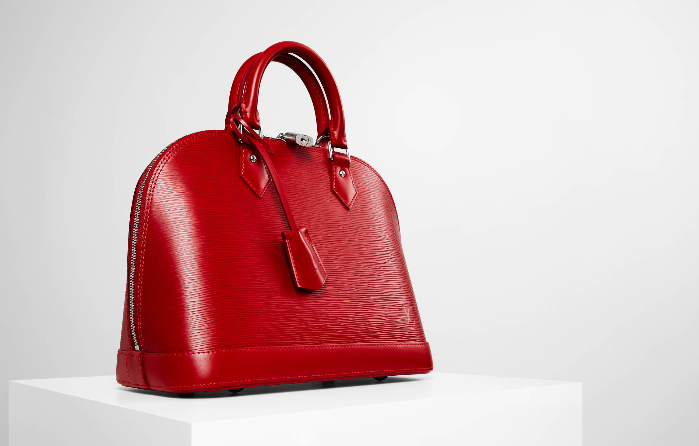 Louis Vuitton red Alma handbag